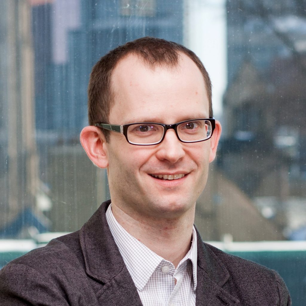 headshot of Paul Thomas